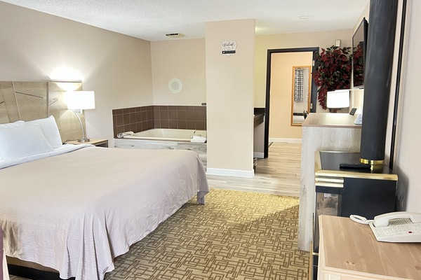 Suite (Whirlpool) | Tabla de planchar con plancha, wifi gratis y ropa de cama