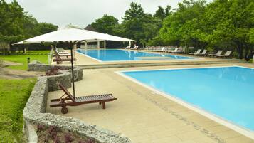 Outdoor pool, open 7 AM to 8 PM, pool umbrellas, sun loungers