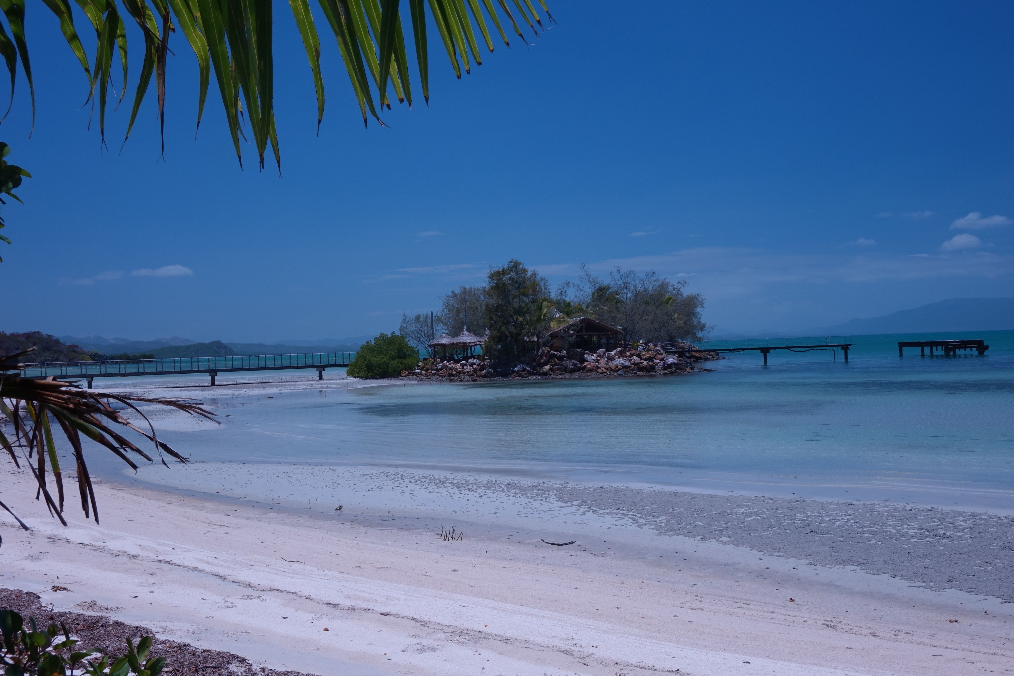 On the beach, white sand, beach towels, scuba diving