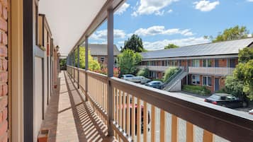 Desk, laptop workspace, blackout curtains, soundproofing