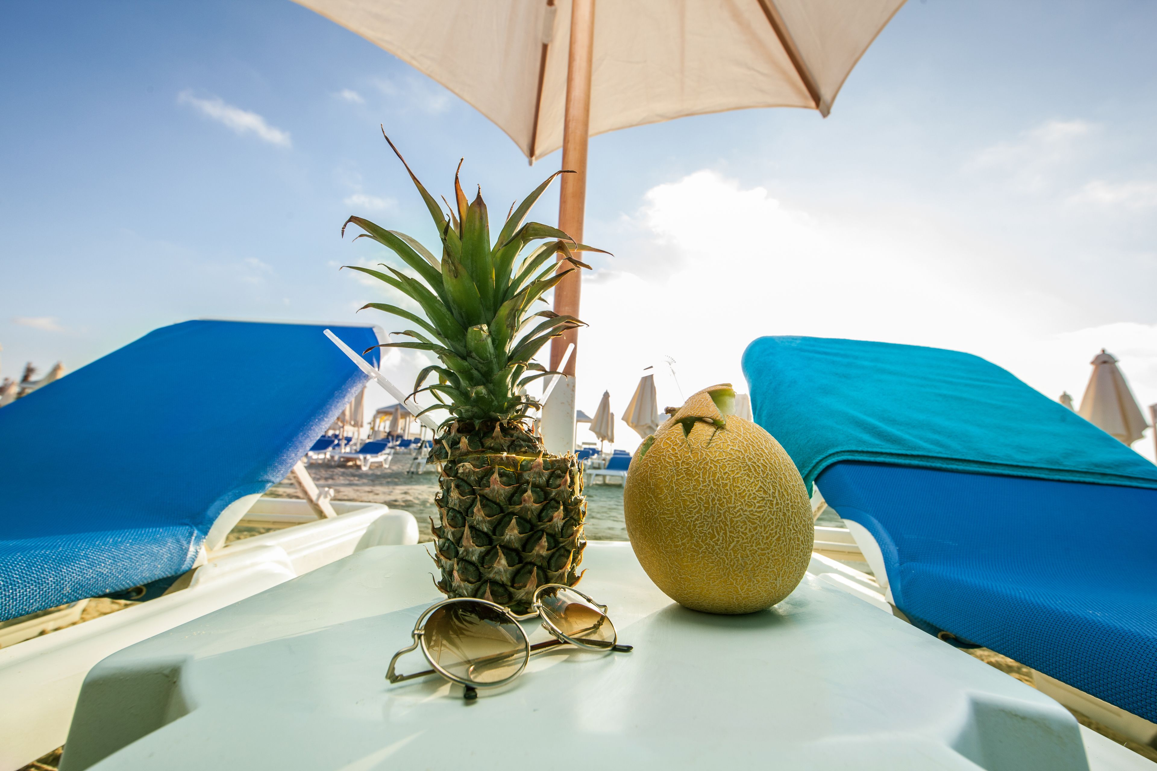 private beach, white sand, beach cabanas, sun-loungers