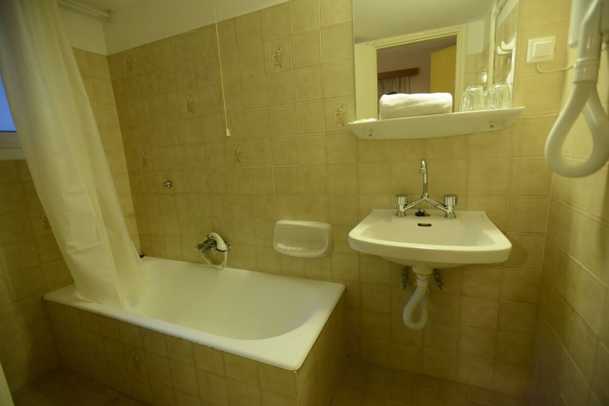 triple room | bathroom | hair dryer, towels