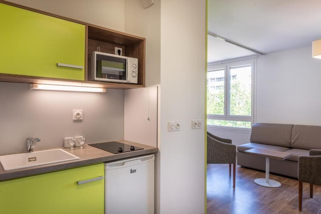 Fridge, microwave, stovetop, coffee/tea maker