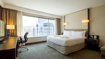 Deluxe Room, 1 King Bed | In-room safe, soundproofing, iron/ironing board, free WiFi