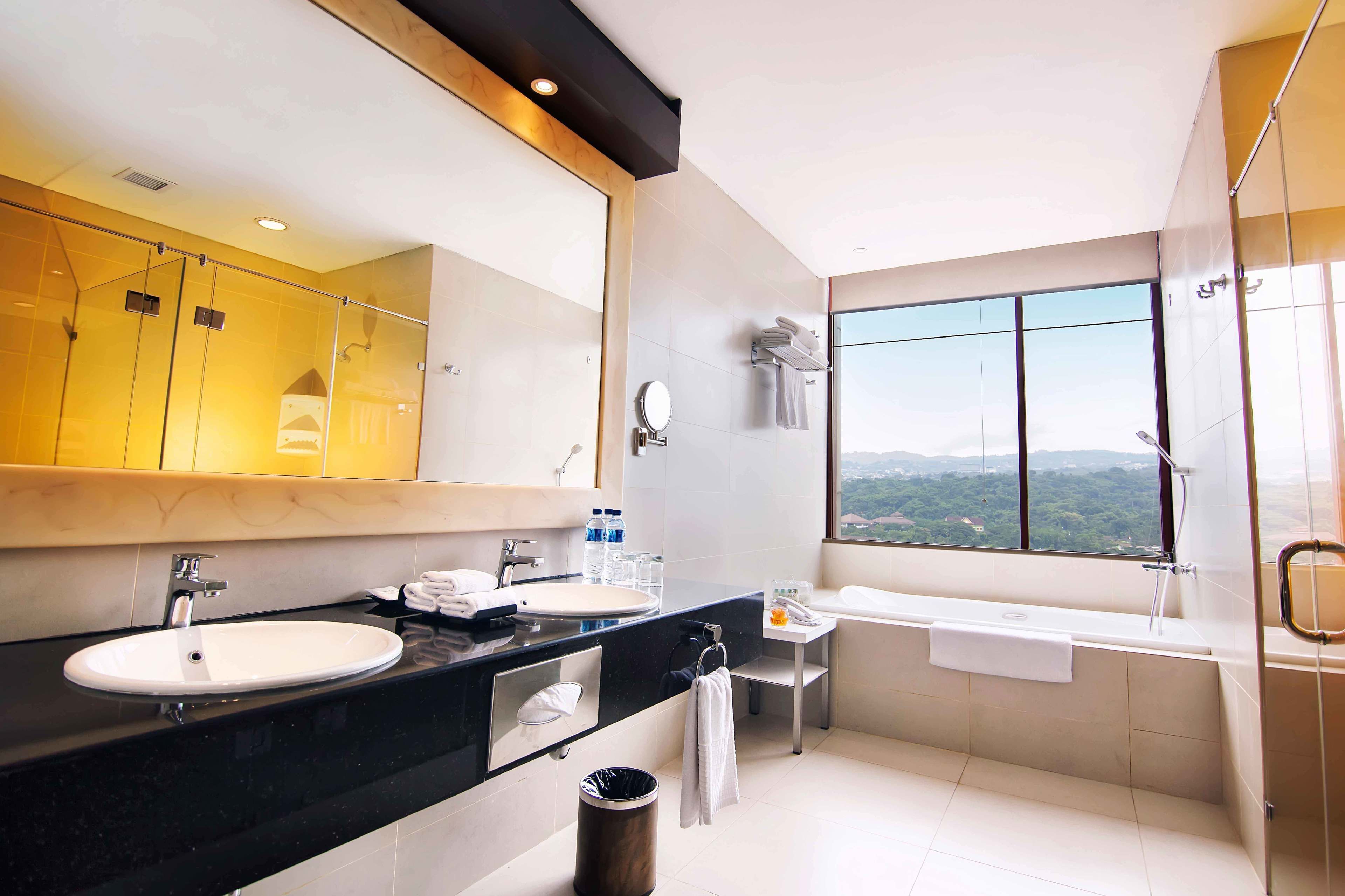 executive room | bathroom | shower, free toiletries, hair dryer, slippers