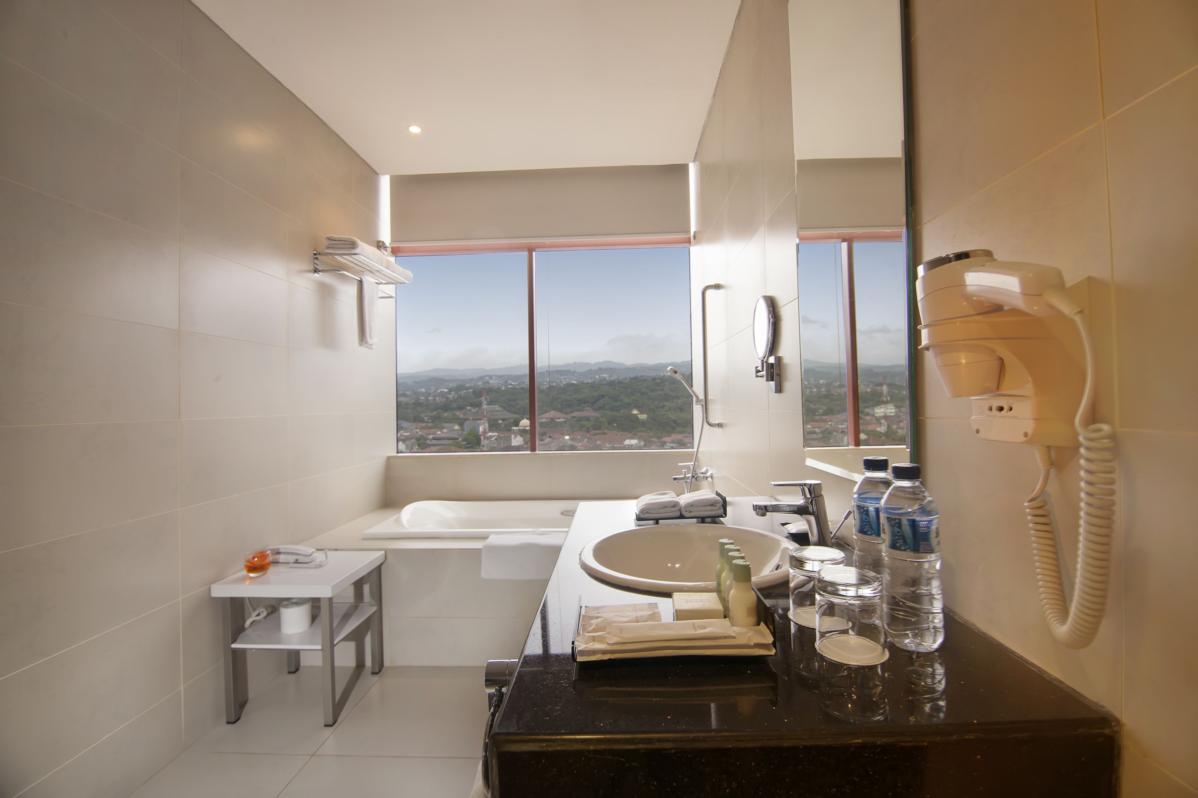 executive room | bathroom | shower, free toiletries, hair dryer, slippers