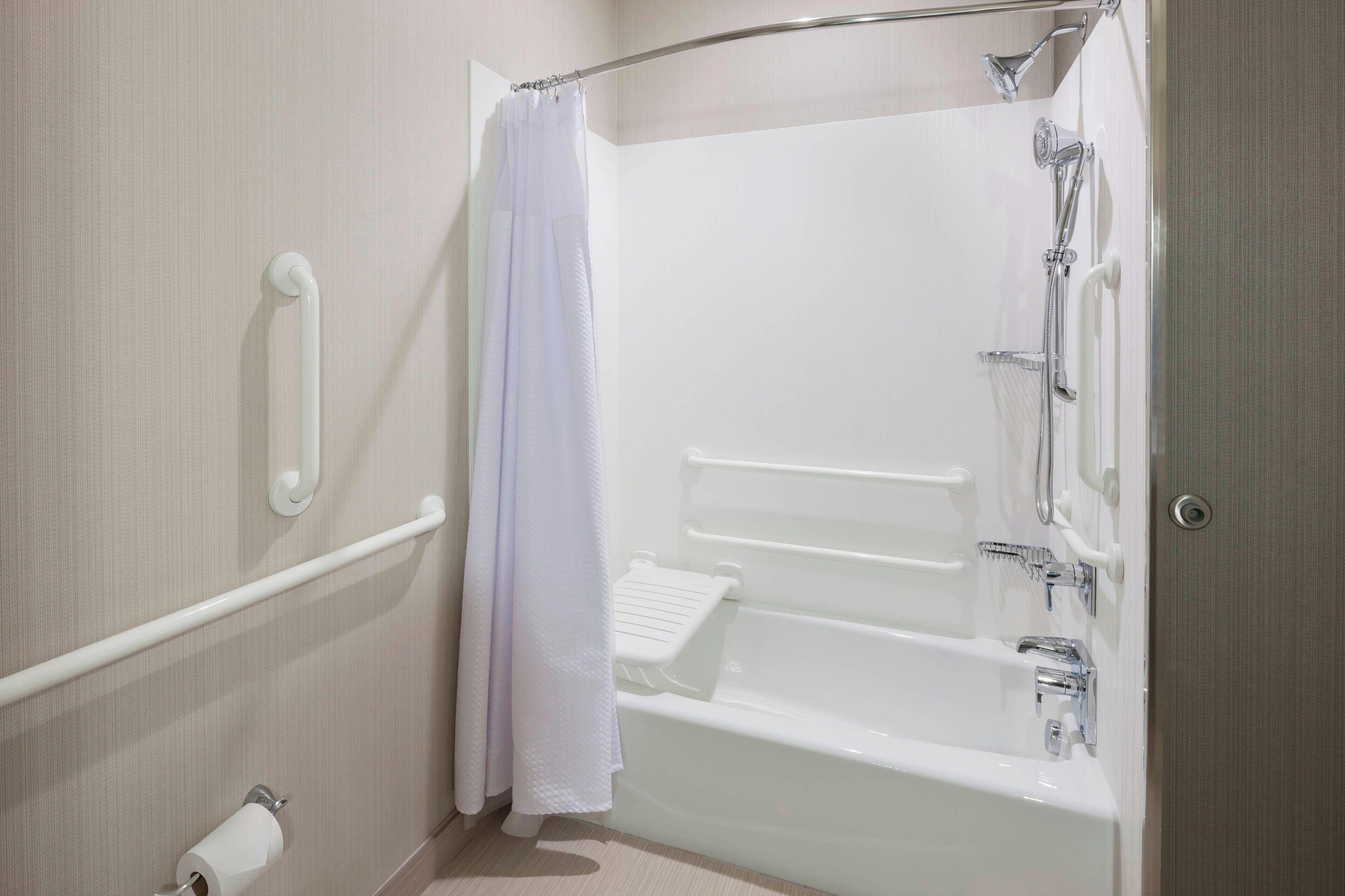 free toiletries, hair dryer, towels, toilet paper