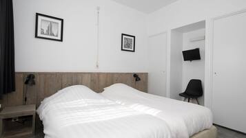 Chambre Double Deluxe, 2 lits une place | Bureau, fer et planche à repasser, Wi-Fi gratuit