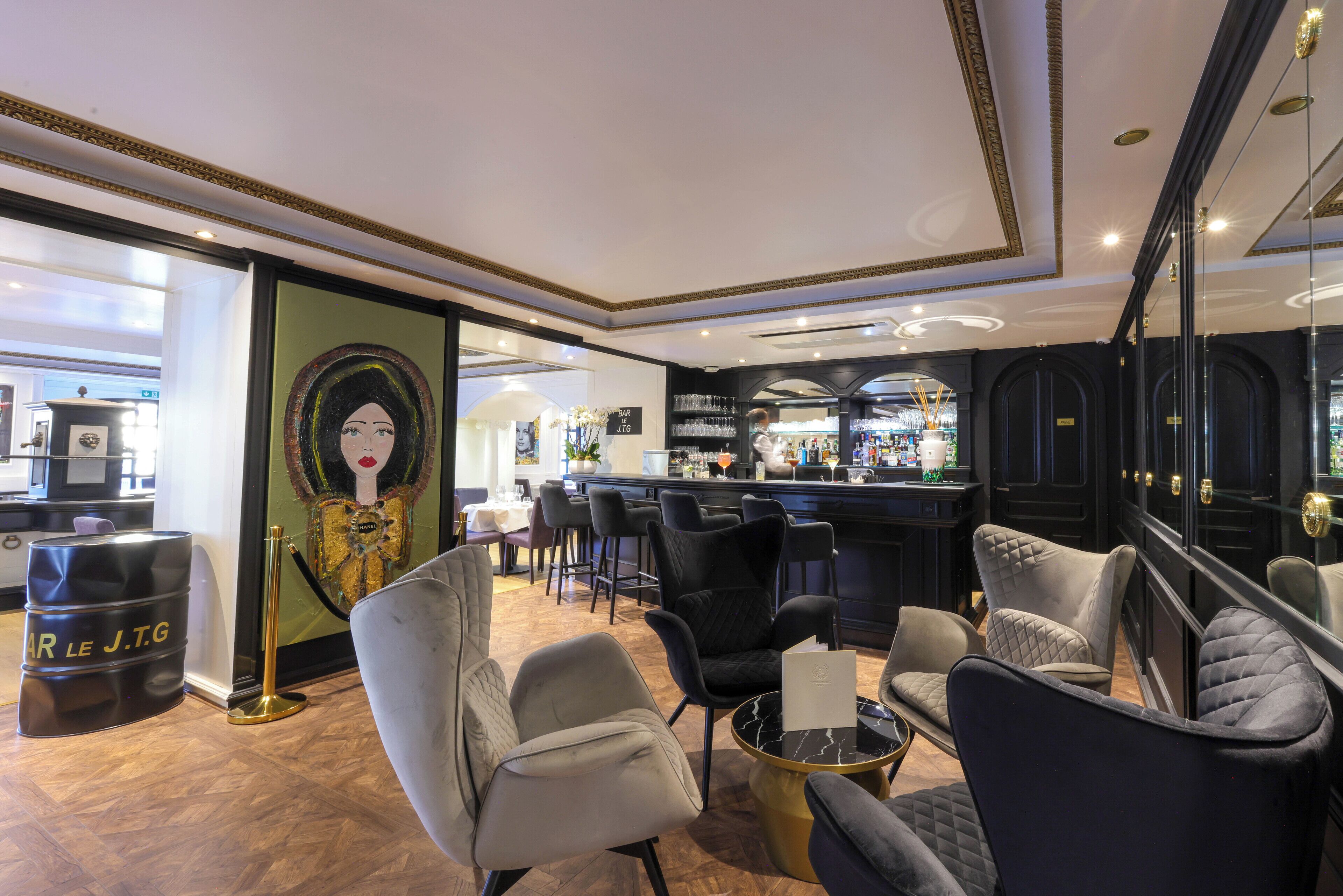 A bar area with seating and a bar counter.