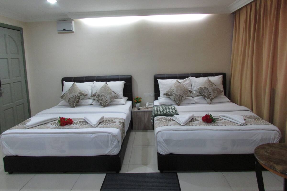 Quadruple Room | Down comforters, minibar, in-room safe, desk