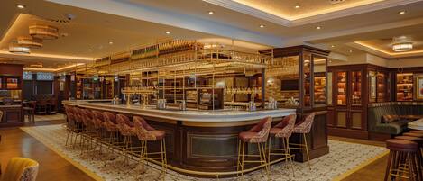 A bar area with a central bar, multiple stools, and a patterned rug.