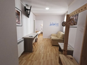 Family Room | In-room safe, individually decorated, individually furnished, desk