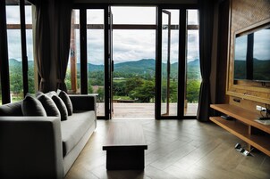 2 Bedroom Pool Villa Grand Mountain View | Living area | 32-inch LCD TV with satellite channels, TV, DVD player