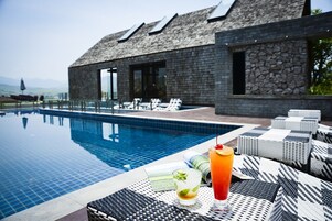 Outdoor pool, open 8:00 AM to 8:00 PM, sun loungers