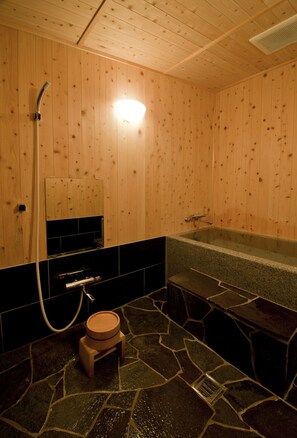 Classic Townhome, 2 Bedrooms, Refrigerator & Microwave | Bathroom | Separate bathtub and shower, deep-soaking bathtub, free toiletries