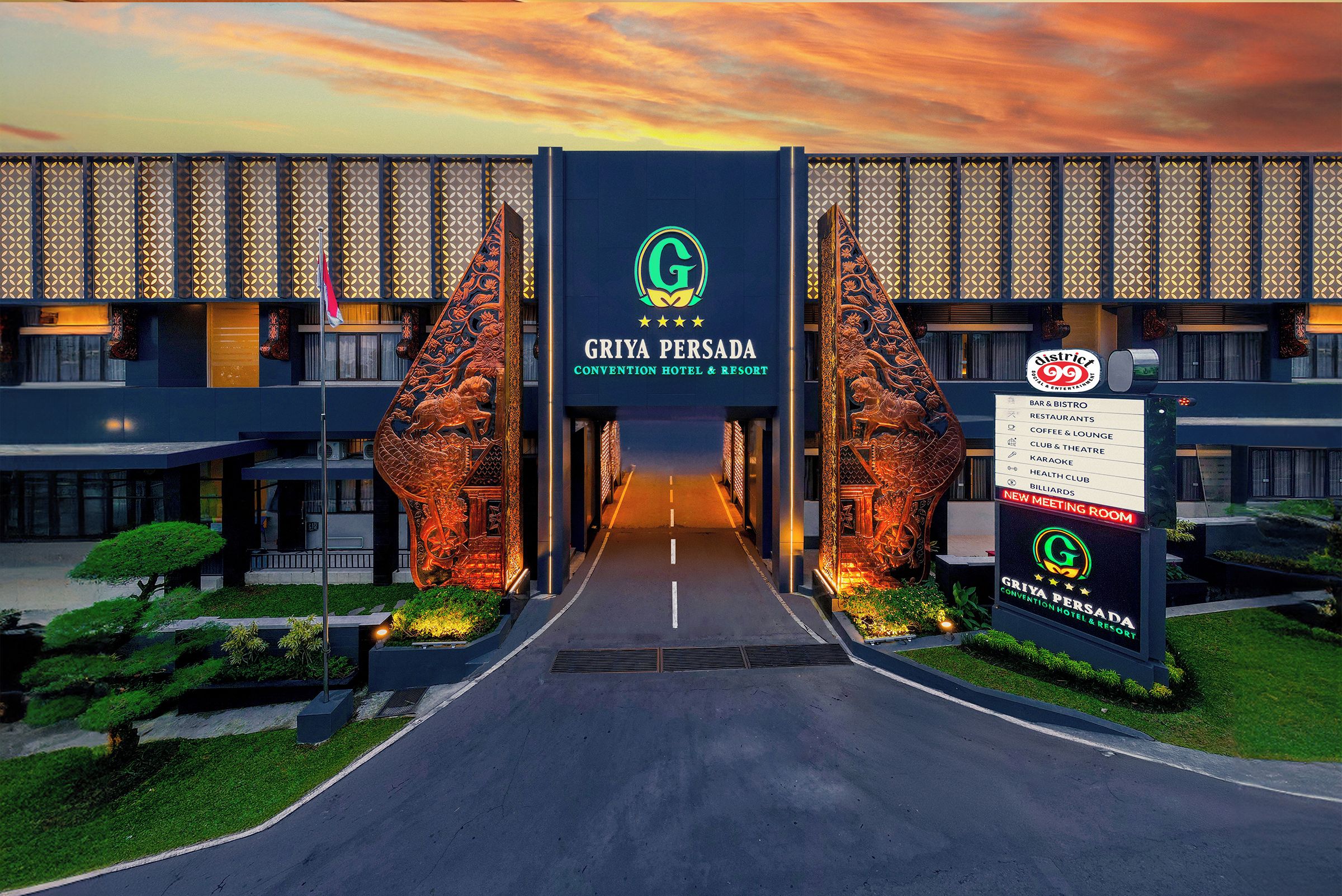 The entrance to the Griya Persada Convention Hotel & Resort with a sign listing amenities like a bar, bistro, and new meeting room.