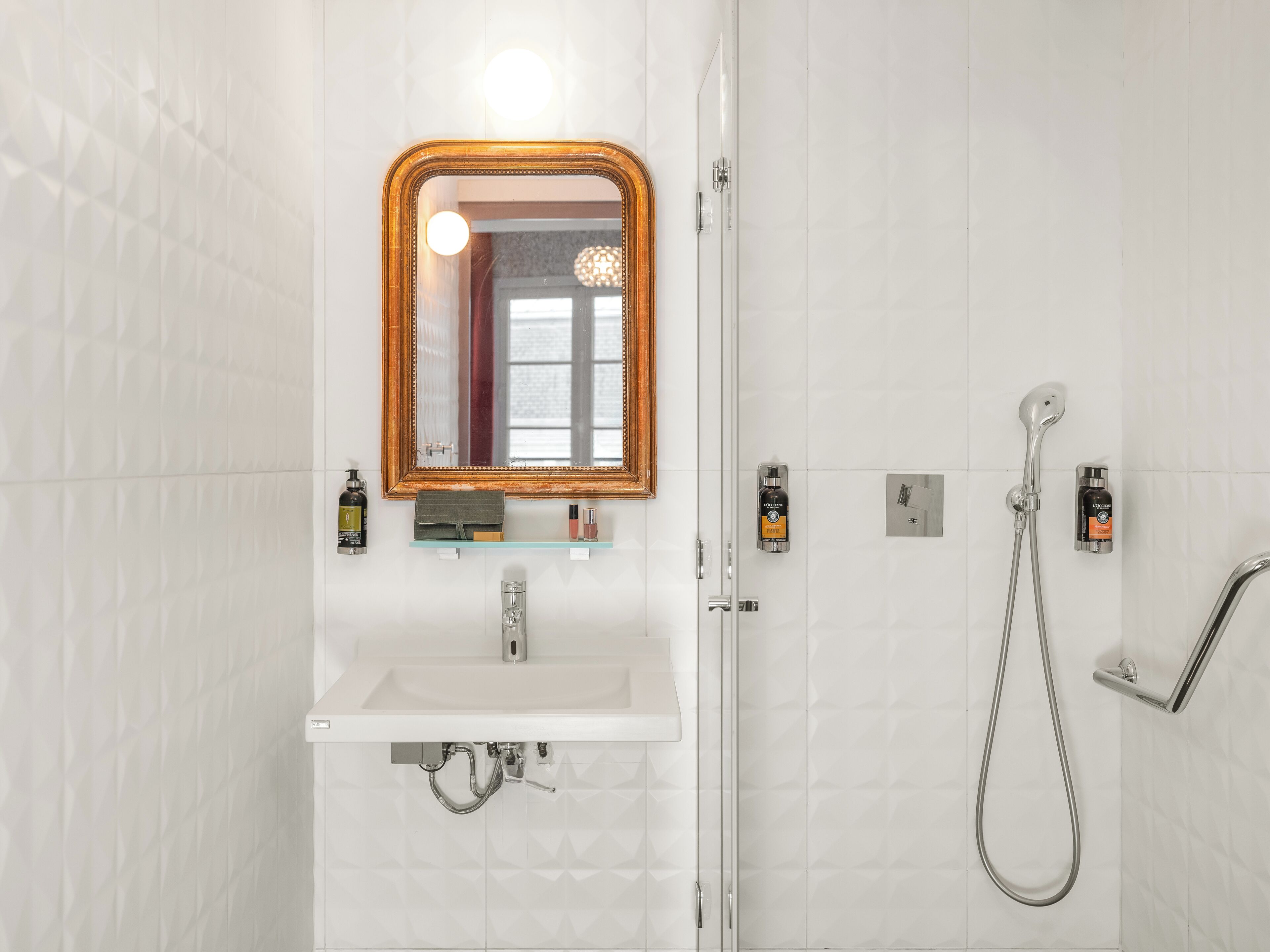 deluxe double room | bathroom | shower, hair dryer, towels, shampoo