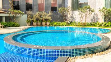 Outdoor pool, pool umbrellas, pool loungers