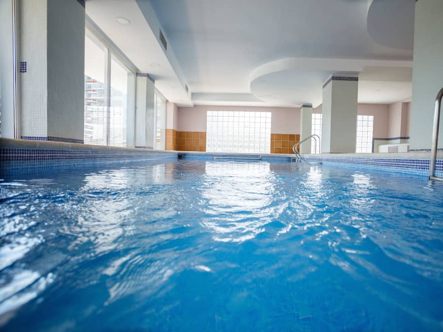 Indoor pool, outdoor pool, pool umbrellas, sun loungers