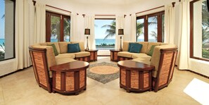 Luxury Ocean Front 2 Bedrooms Master Suite w/private pool | Living room | Flat-screen TV