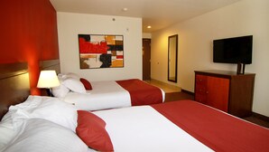 A hotel room with two beds, a TV, a painting, and a wooden cabinet. - Pahrump Nugget Hotel and Casino (Pahrump)