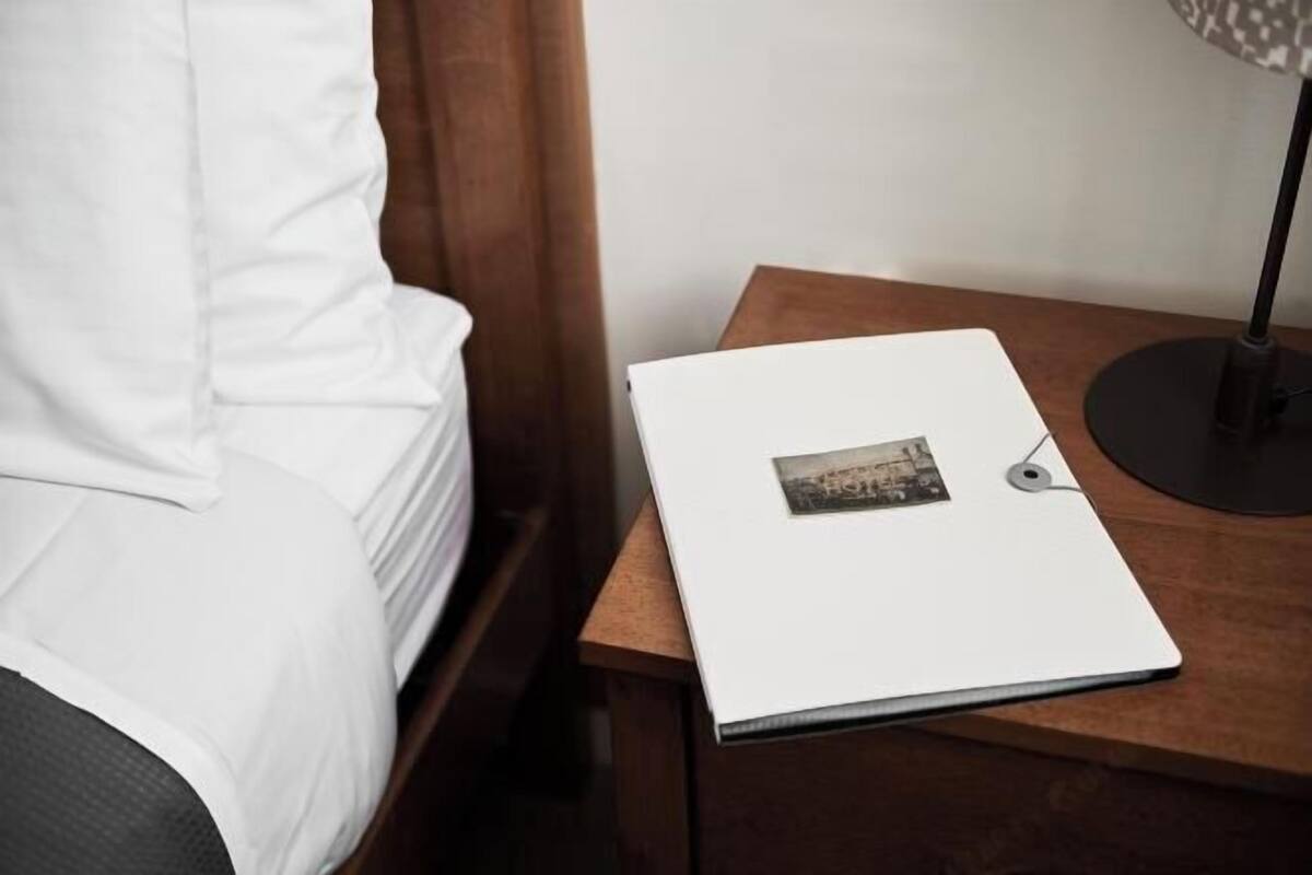 Frette Italian sheets, premium bedding, down comforters, minibar