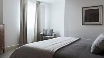 Frette Italian sheets, premium bedding, down duvets, minibar