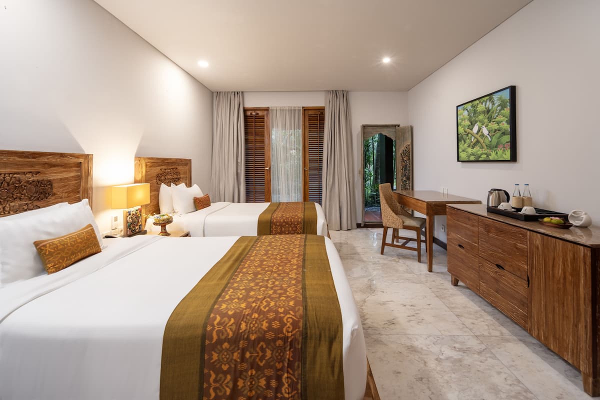 Deluxe kamer | 1 slaapkamer, een gratis minibar, een kluis op de kamer, een bureau
