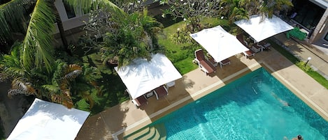 Outdoor pool, open 8:00 AM to 9:00 PM, pool umbrellas, sun loungers