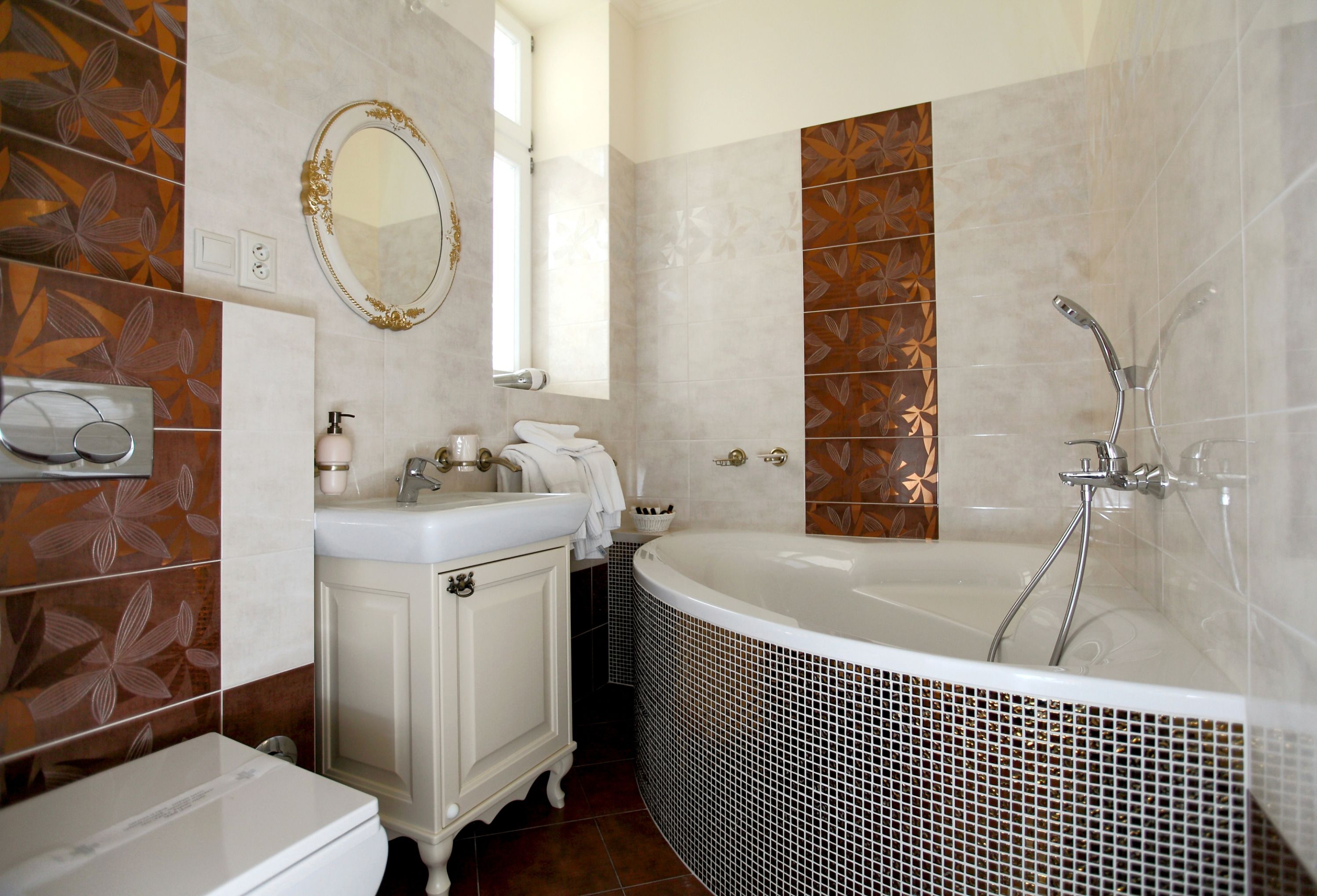 deluxe apartment | bathroom | designer toiletries, hair dryer, bathrobes, slippers