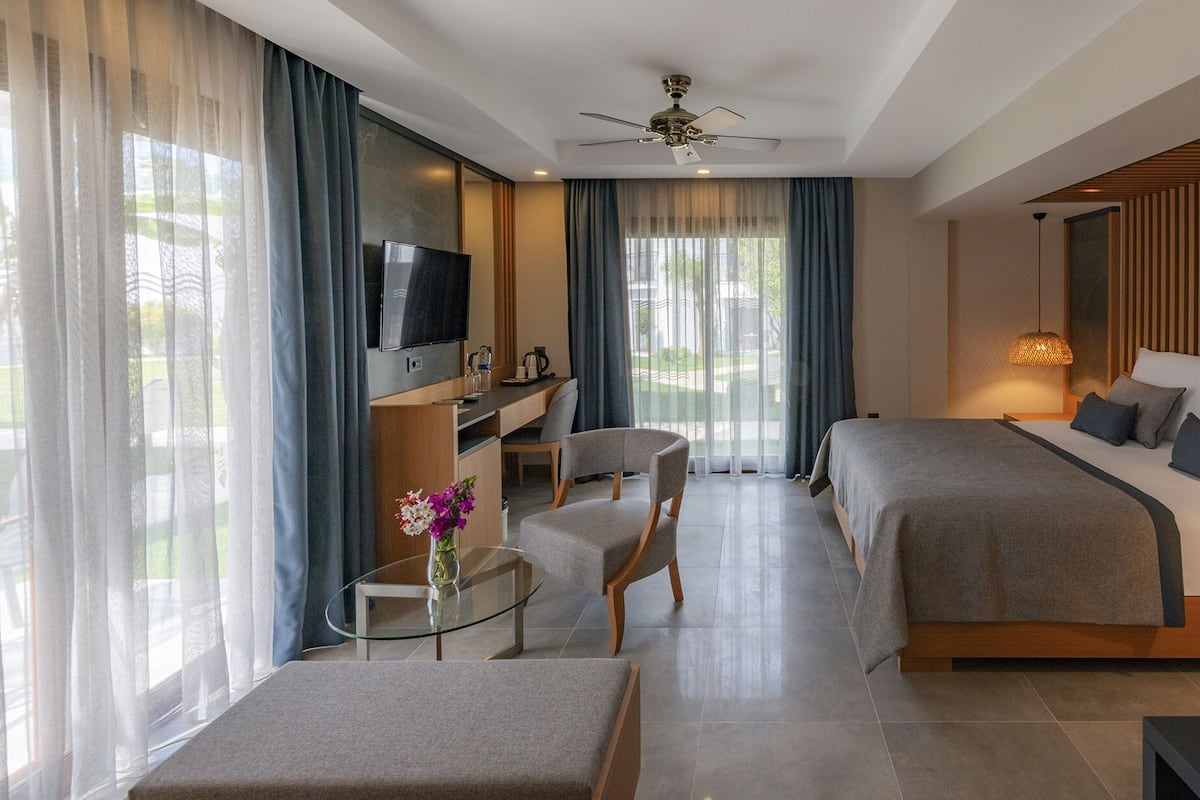 Deluxe Garden Room | 1 slaapkamer, luxe beddengoed, een gratis minibar, een kluis op de kamer