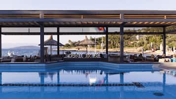 Indoor pool, seasonal outdoor pool, pool umbrellas, pool loungers