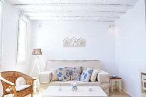 Deluxe Suite, Terrace, Sea View | Living area | 32-inch flat-screen TV with digital channels, TV