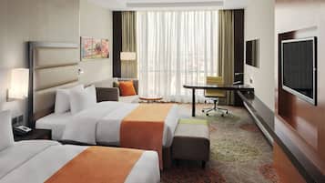Roupas de cama premium, frigobar, cofres nos quartos