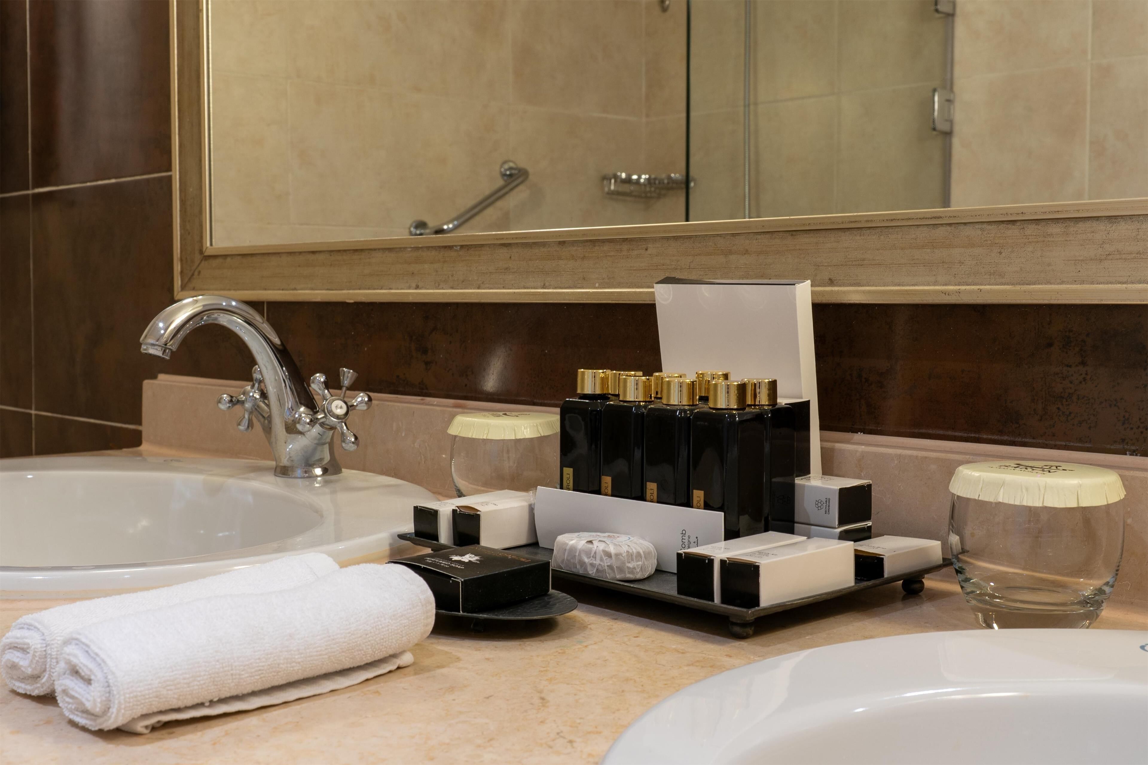 shower, designer toiletries, hair dryer, bathrobes