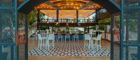 3 bars/lounges, poolside bar, beach bar