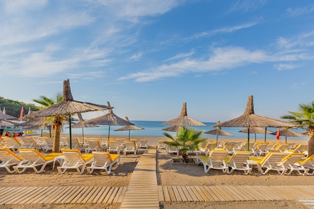 Private beach, sun loungers, beach umbrellas, beach towels