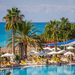Indoor pool, 2 outdoor pools, open 8:00 AM to 7:00 PM, pool umbrellas