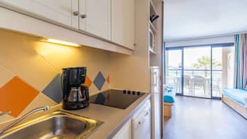 Appartement en Duplex | Dapur pribadi | Lemari es, microwave, kompor, dan mesin pencuci piring