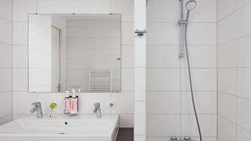 Shower, deep soaking tub, free toiletries, hair dryer