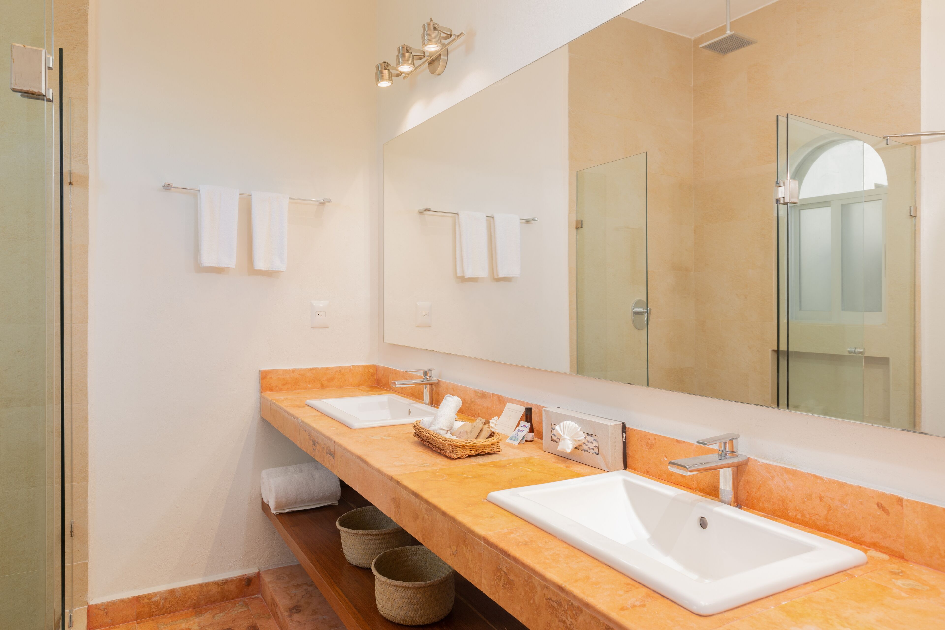 presidential studio suite | bathroom | shower, rainfall showerhead, free toiletries, hair dryer