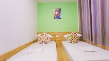 Habitación estándar con 2 camas individuales | 18 habitaciones, caja de seguridad en la habitación y cortinas blackout