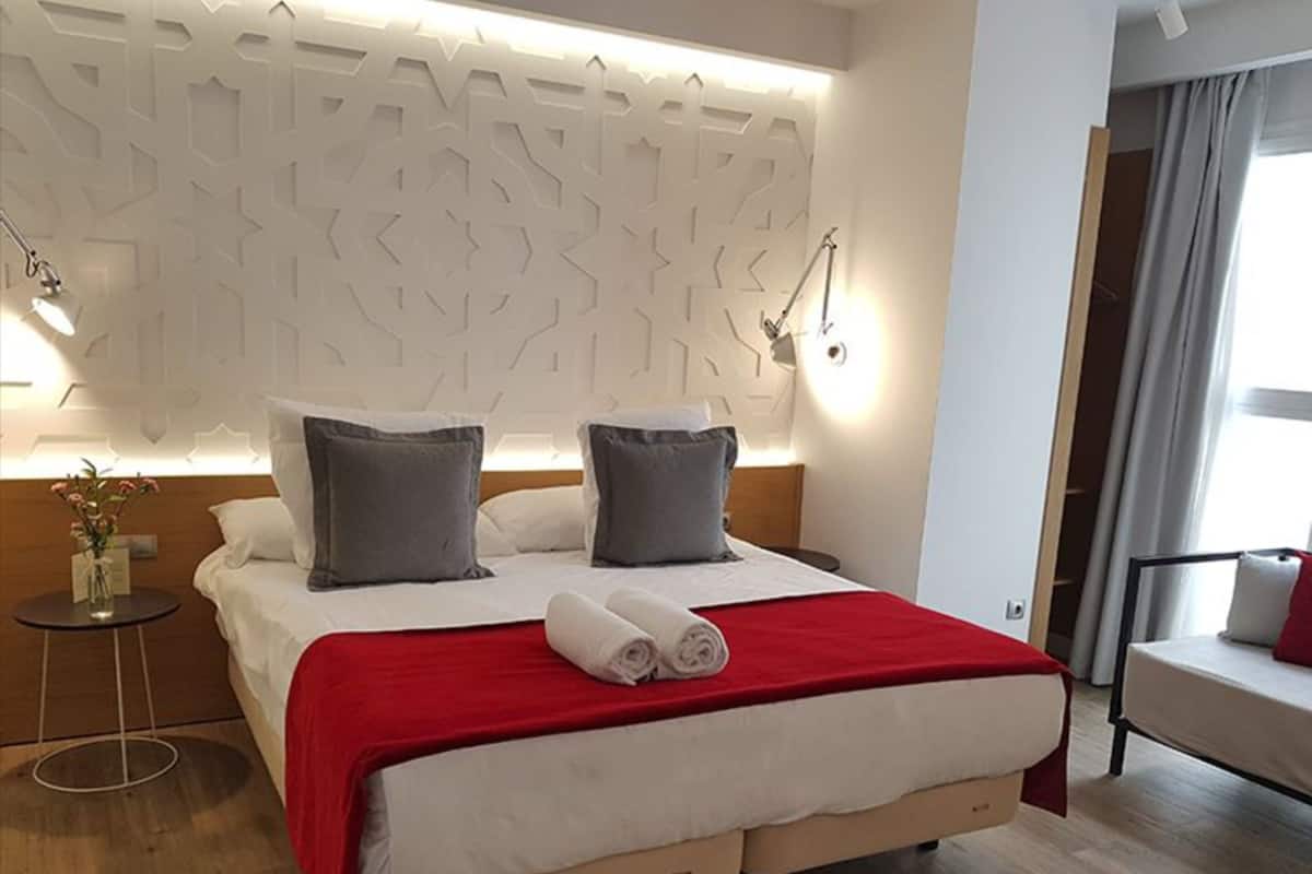 1 habitación, ropa de cama de alta calidad y minibar
