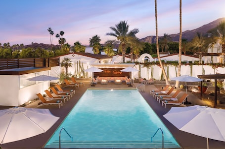 Outdoor pool, open 8:00 AM to 10:00 PM, pool umbrellas, sun loungers