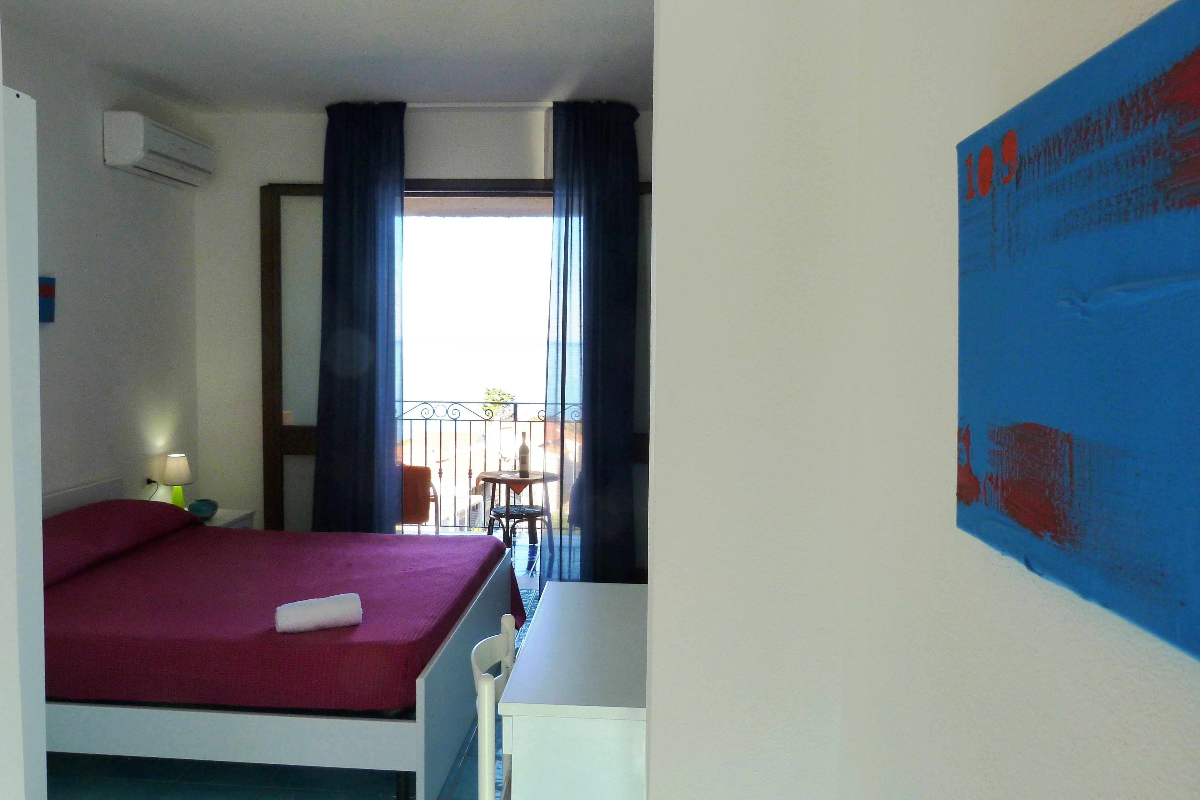 double room, balcony, sea view | minibar, in-room safe, desk, blackout curtains