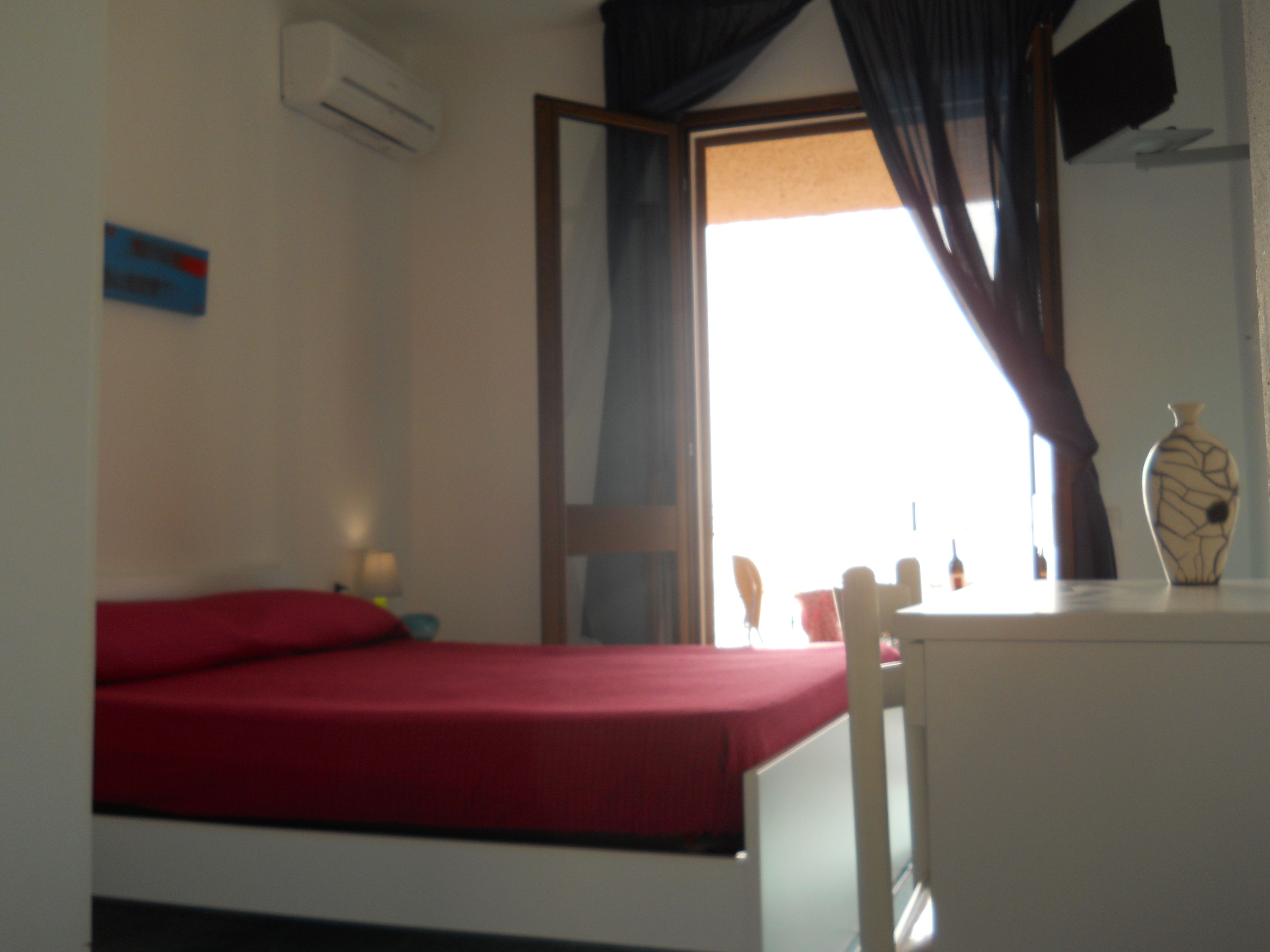 double room, balcony, sea view | minibar, in-room safe, desk, blackout curtains