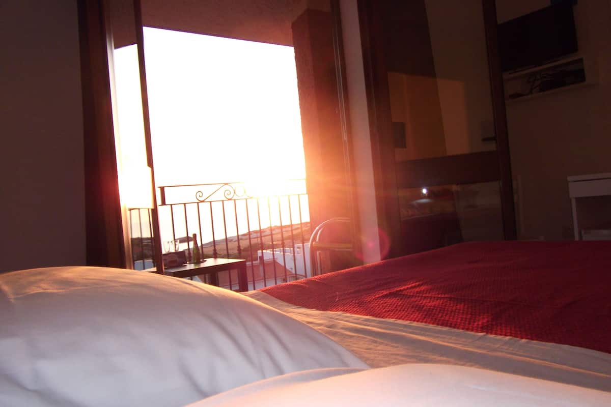 triple room, balcony, sea view | minibar, in-room safe, desk, blackout curtains