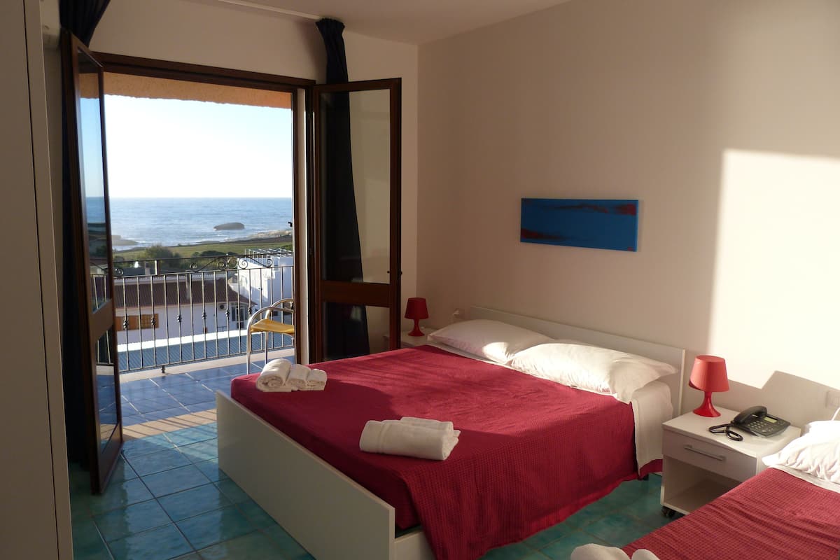 triple room, balcony, sea view | minibar, in-room safe, desk, blackout curtains