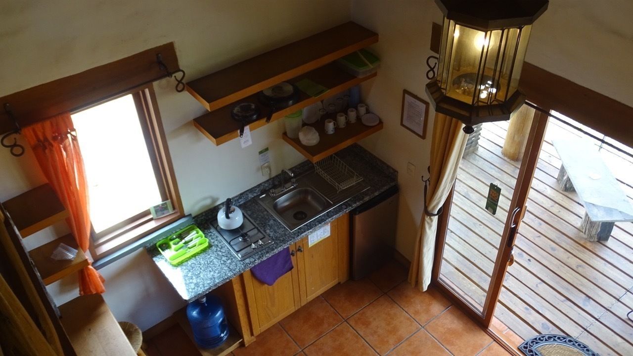 full-sized fridge, microwave, coffee/tea maker, cookware/dishes/utensils