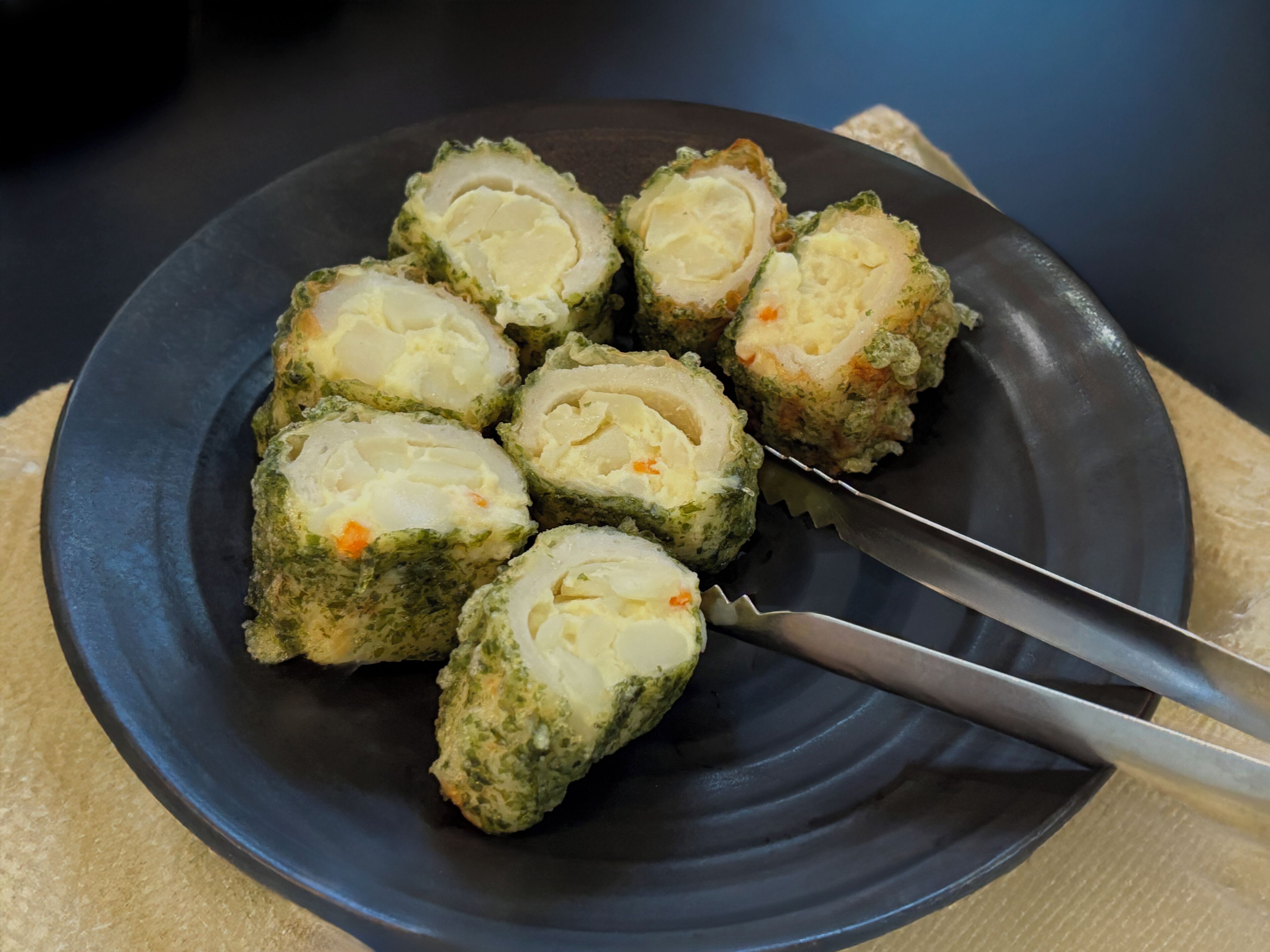 A plate of food with a knife.